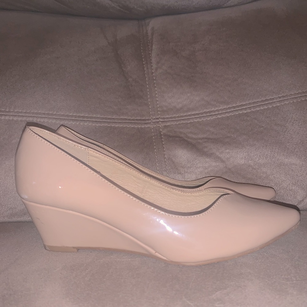 Tan low heel. Size 7-7.5.